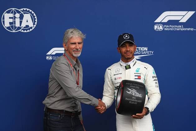 25th August 2018, Circuit de Spa-Francorchamps, Francorchamps, Belgium, Formula One Grand Prix of Belgium, Qualification; Mercedes AMG Petronas Motorsport AMG, Lewis Hamilton receives the Pirelli Pole Position Award from Damon Hill  ActionPlus12057994 Octane