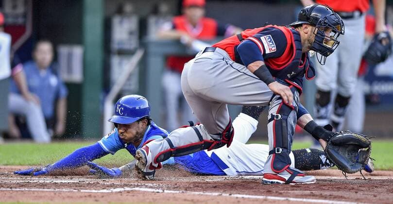 August 25, 2018 - Kansas City, MO, USA - Kansas City Royals Adalberto Mondesi scores behind Cleveland Indians catcher Yan Gomes on a single by Whit Merrifield in the third inning on Saturday, Aug. 25, 2018 at Kauffman Stadium in Kansas City, Mo. Cleveland Indians vs. Kansas City Royals - ZUMAm67_ 20180825_zaf_m67_030 Copyright: xJohnxSleezerx