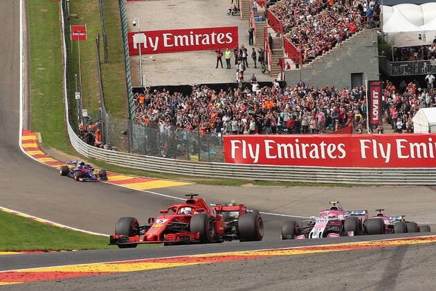 Ferrari s German driver Sebastian Vettel and Force India s French driver Esteban Ocon pictured in action during the Spa-Francorchamps Formula One Grand Prix of Belgium race, in Spa-Francorchamps, Sunday 26 August 2018. BRUNOxFAHY  x05414244x