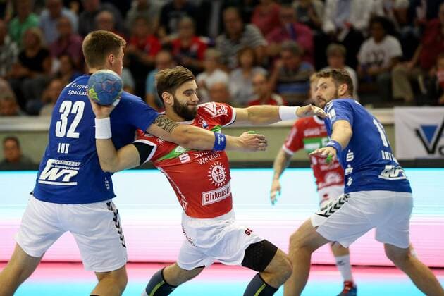 Bjoern Zintel (TV Huettenberg, 31), Jonathan Fischer (EHV Aue, 32) TV Huettenberg - EHV Aue, 2. HBL Giessen