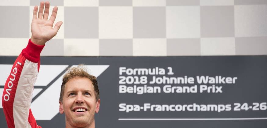 Ferrari s German driver Sebastian Vettel celebrates on the podium after winning the Spa-Francorchamps Formula One Grand Prix of Belgium race, in Spa-Francorchamps, Sunday 26 August 2018. BENOITxDOPPAGNE  x05414413x