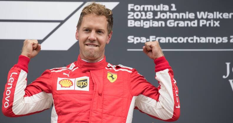 Ferrari s German driver Sebastian Vettel celebrates on the podium after winning the Spa-Francorchamps Formula One Grand Prix of Belgium race, in Spa-Francorchamps, Sunday 26 August 2018. BENOITxDOPPAGNE  x05414416x