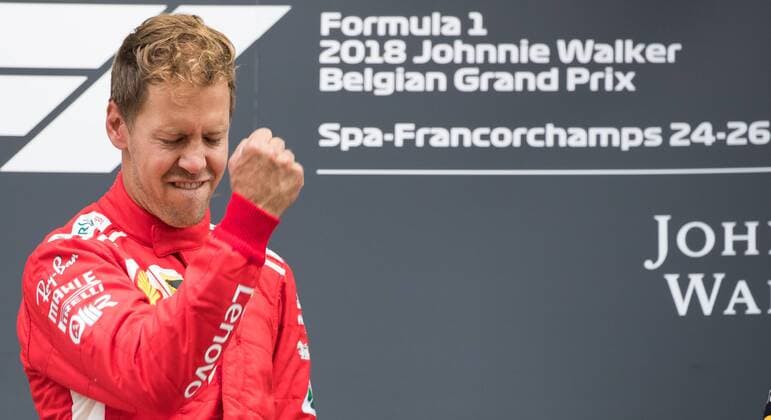 Ferrari s German driver Sebastian Vettel celebrates on the podium after winning the Spa-Francorchamps Formula One Grand Prix of Belgium race, in Spa-Francorchamps, Sunday 26 August 2018. BENOITxDOPPAGNE  x05414418x