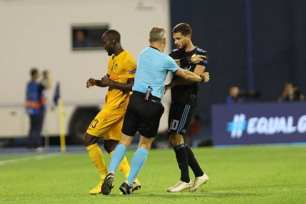 Zagreb, 28 08 2018 - Stadion Maksimir, UEFA Champions League - 2018 19, GNK Dinamo (blue) - BSC Young Boys (yellow) 1:2, Nicolas Moumi Ngamaleu (13), Petar Stojanovic (30) and referee Bjorn Kuipers (NED) 