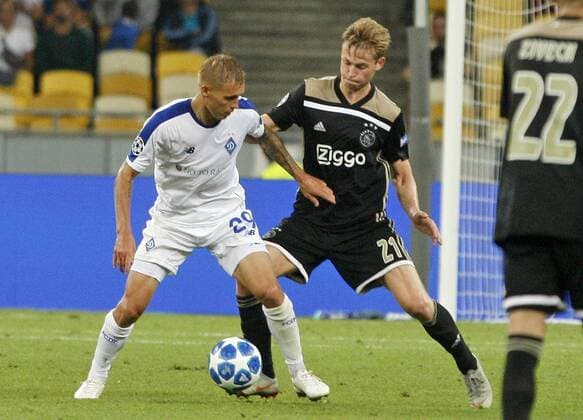 August 28, 2018 - Kiev, Ukraine - VITALIY BUYALSKIY (L) of Dynamo and FRENKIE DE JONG (R) of Ajax in action during the UEFA Champions League play-off, second leg, soccer match between FC Dynamo Kyiv and Ajax Amsterdam, at the Olimpiyskiy stadium in Kiev, Ukraine, on 28 August 2018. Ajax Amsterdam vs FC Dynamo Kiev , UEFA Champions League soccer match - ZUMAg194 20180828_zap_g194_019 Copyright: xSergxGlovnyx