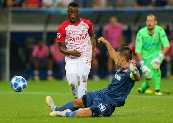SOCCER - CL quali, RBS vs Belgrade SALZBURG,AUSTRIA,29.AUG.18 - SOCCER - UEFA Champions League qualification play-off, Red Bull Salzburg vs FC Red Star Belgrade. Image shows Patson Daka (RBS) and Vujadin Savic (Belgrade). GEPAxpictures xThomasxBachun