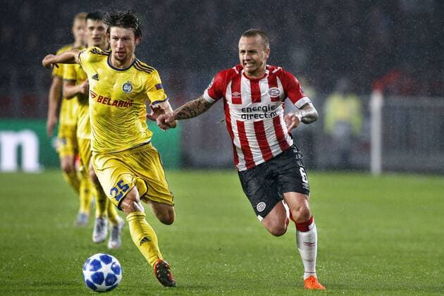 EINDHOVEN, Netherlands, 29-08-2018, football, Champions League play-off round 4 leg 2 , season 2018 2019 , PSV Philips Stadium , PSV - BATE Borisov , Borisov player Dmitri Baga (L) and PSV defender Angelino ( Jose Angel Tasende ) during the game PSV - BATE Borisov . PSV - Borisov  x2432797x