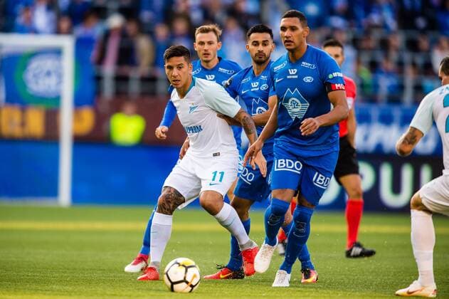 180830 Sebastian Driussi of Zenit and Lunan Ruben Gabrielsen of Molde during the UEFA Europa League play-off match between Molde and FK Zenit St. Petersburg on August 30, 2018 in Molde. Copyright: MARIUSxSIMENSEN BB180830BB504