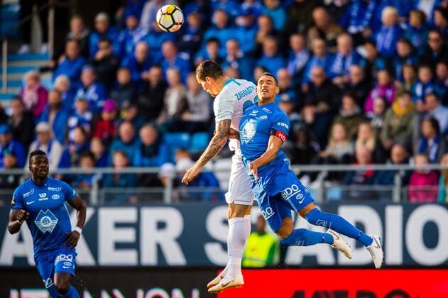 180830 Anton Zabolotny of Zenit and Lunan Ruben Gabrielsen of Molde during the UEFA Europa League play-off match between Molde and FK Zenit St. Petersburg on August 30, 2018 in Molde. Copyright: MARIUSxSIMENSEN BB180830BB507