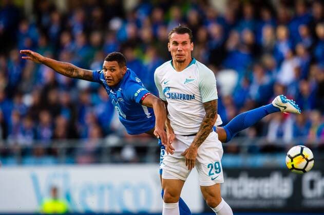 180830 Anton Zabolotny of Zenit and Lunan Ruben Gabrielsen of Molde during the UEFA Europa League play-off match between Molde and FK Zenit St. Petersburg on August 30, 2018 in Molde. Copyright: MARIUSxSIMENSEN BB180830BB508