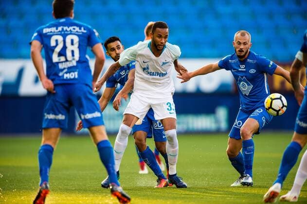180830 Hernani of Zenit and Eirik Hestad of Molde during the UEFA Europa League play-off match between Molde and FK Zenit St. Petersburg on August 30, 2018 in Molde. Copyright: MARIUSxSIMENSEN BB180830BB513