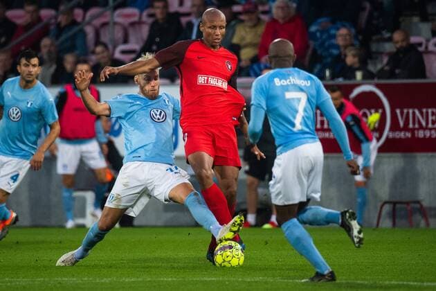 180830 Ayo Simon Okosun of Midtjylland and Rasmus Bengtsson of Malmö FF during the Europa League qualifying match between Midtjylland and Malmö FF on August 30, 2018 in Herning. Photo: Ludvig Thunman BILDBYRN kod LT 35529 Copyright: LUDVIGxTHUNMAN BB180830LT062