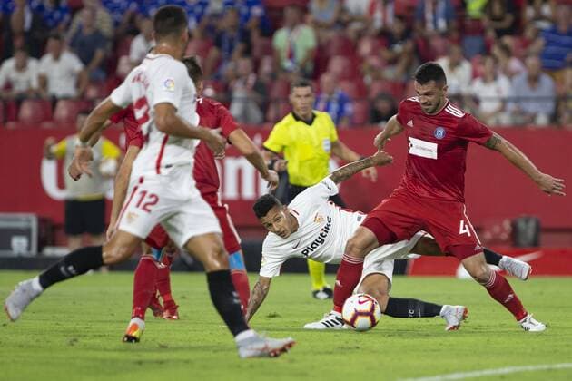 Spain: Sevilla FC vs SIgma Olomuc 30th August 2018, Ramon Sanchez Pizjuan, Sevilla, Spain; UEFA Europa League football, Sevilla FC versus Sigma Olomuc; Jan Kotouc, player of Sigma Olomouc challenge the ball against Guilherme Arana, player of Sevilla FC Sevilla Andalucia Spain Ramon Sanchez Pizjuan  UKKOxImages AntonioxPozo PacificxPress