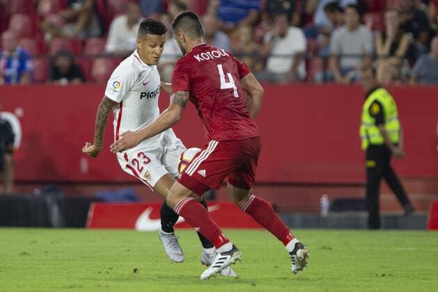 Spain: Sevilla FC vs SIgma Olomuc 30th August 2018, Ramon Sanchez Pizjuan, Sevilla, Spain; UEFA Europa League football, Sevilla FC versus Sigma Olomuc; Guilherme Arana, player of Sevilla FC against Jan Kotouc, player of Sigma Olomouc Sevilla Andalucia Spain Ramon Sanchez Pizjuan  UKKOxImages AntonioxPozo PacificxPress