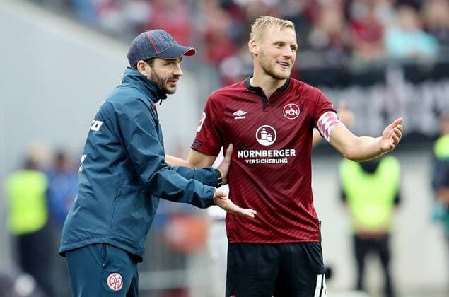 Deutschland, Nuernberg, Max-Morlock-Stadion, 01.09.2018, Fussball - 1. Bundesliga - 2. Spieltag - 1. FC Nuernberg - 1. FSV Mainz 05 v. lk. Trainer Sandro Schwarz (1. FSV Mainz 05) und Hanno Behrens (1.FC Nuernberg, 18) DFL REGULATIONS PROHIBIT ANY USE OF PHOTOGRAPHS AS IMAGE SEQUENCES AND OR QUASI-VIDEO. Fussball - 1. Bundesliga - 2. Spieltag - 1. FC Nuernberg - 1. FSV Mainz 05 Nuernberg *** Germany Nuernberg Max Morlock Stadium 01 09 2018 Soccer 1 Bundesliga 2 Gameday 1 FC Nuernberg 1 FSV Mainz 05 v. Lk Coaches Sandro Schwarz 1 FSV Mainz 05 and Hanno Behrens 1 FC Nuremberg 18 DFL REGULATIONS PROHIBIT ANY USE OF PHOTOGRAPH AS IMAGE SEQUENCES AND OR QUASI VIDEO Soccer 1 Bundesliga 2 Gameday 1 FC Nuernberg 1 FSV Mainz 05 Nuernberg Copyright: xEIBNER BECx EP_BEC