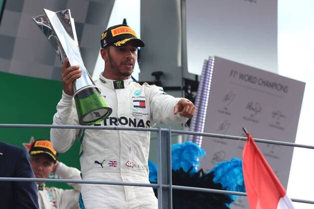 2nd September 2018, Autodromo Nazionale Monza, Monza, Italy, Formula One Grand Prix of Italy, race day; Mercedes AMG Petronas Motorsport, Lewis Hamilton holds his trophy on the podium as he wins the race  ActionPlus12060223 Octane