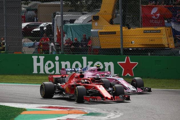 Photo4 LaPresse 02 09 2018 Monza, Italy Grand Prix Formula One Italia 2018 In the pic: Sebastian Vettel (GER) Scuderia Ferrari SF71H and Esteban Ocon (FRA) Racing Point Force India F1 VJM11  Copyright: xPhoto4 LaPressex
