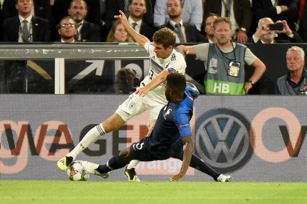 Thomas Müller (GER) und Samuel Umtiti (FRA). Deutschland, Muenchen, 06.09.2018, Fussball, Nationalmannschaft, UEFA Nations League, 1.Spieltag: Deutschland vs Frankreich, Allianz-Arena DFL DFB REGULATIONS PROHIBIT ANY USE OF PHOTOGRAPHS AS IMAGE SEQUENCES AND OR QUASI-VIDEO.