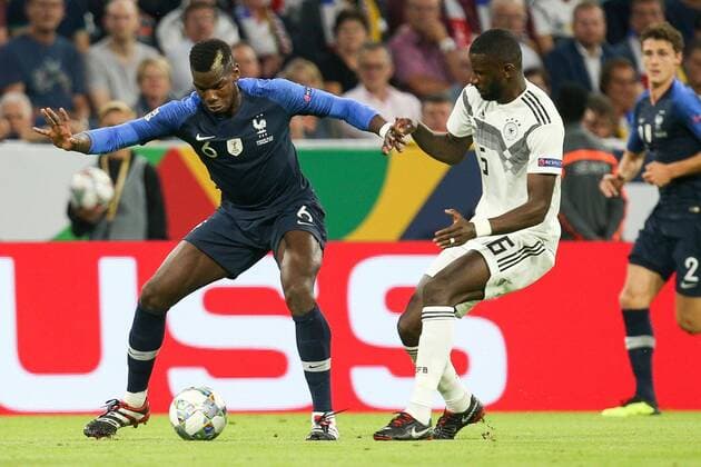 l-r: im Zweikampf, Aktion, mit Paul Pogba 6 (Frankreich) und Antonio Ruediger 16 (Deutschland), Deutschland vs. Frankreich, Fussball, UEFA Nations League, 06.09.2018, DFB regulations prohibit any use of photographs as image sequences and or quasi-video Muenchen Bayern Deutschland