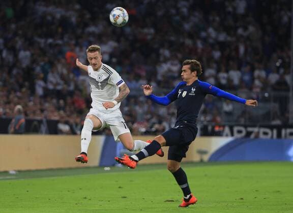 06.09.2018,UEFA Nations League, Deutschland vs Frankreich, Allianz Arena Muenchen, Fussball, im Bild: Marco Reus ( Deutschland) vs Antoine Griezmann (France) DFL REGULATIONS PROHIBIT ANY USE OF PHOTOGRAPHS AS IMAGE SEQUENCES AND OR QUASI VIDEO.
