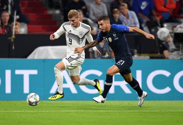FUSSBALL UEFA Nations League in Muenchen Deutschland - Frankreich 06.09.2018 Timo Werner (li, Deutschland) gegen Lucas Hernandez (re, Frankreich) --- DFB regulations prohibit any use of photographs as image sequences and or quasi-video. ---