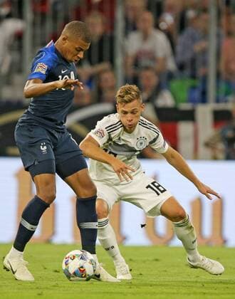 SOCCER - UEFA NL, GER vs FRA MUNICH,GERMANY,06.SEP.18 - SOCCER - UEFA Nations League, Germany vs France, international match Länderspiel Image shows Kylian Mbappe (FRA) and Joshua Kimmich (GER). GEPAxpictures xThomasxBachun