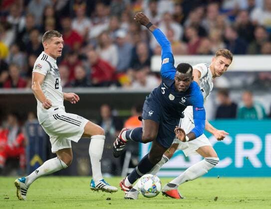 vl: Toni Kroos (GER), Paul Pogba (FRA) und Leon Goretzka (GER) Fussball international UEFA Nations League - Saison 2018 2019, Gruppenspiel: Deutschland - Frankreich in Muenchen, Deutschland am 06.09.2018,