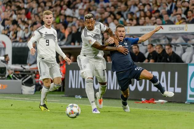 Muenchen, Deutschland 06.09.2018, UEFA Nations League, Deutschland - Frankreich, Timo Werner (GER), Jerome Boateng (GER) und Lucas Hernandez (FRA) im Zweikampf ( DeFodi527