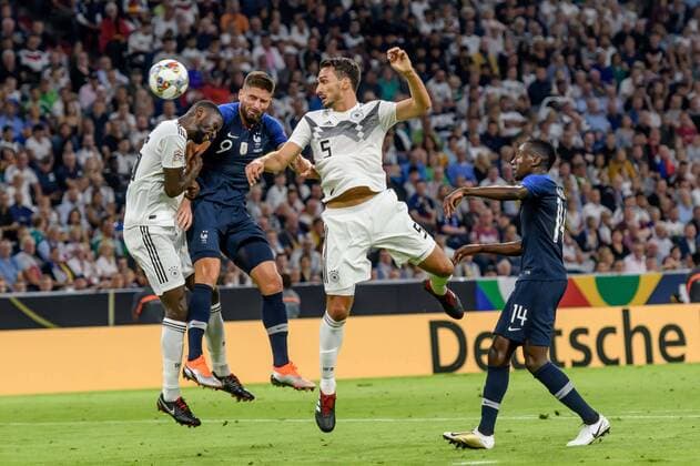 Muenchen, Deutschland 06.09.2018, UEFA Nations League, Deutschland - Frankreich, Antonio Ruediger (GER), Olivier Giroud (FRA), Mats Hummels (GER) und Steven NZonzi (FRA) im Zweikampf ( DeFodi527
