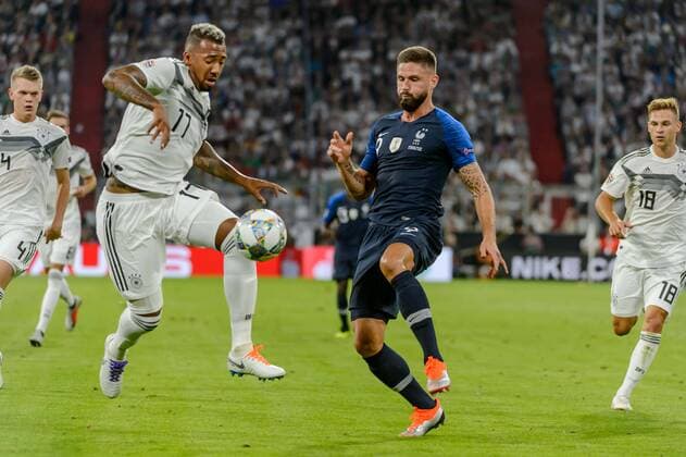 Muenchen, Deutschland 06.09.2018, UEFA Nations League, Deutschland - Frankreich, Jerome Boateng (GER) und Thomas Lemar (FRA) im Zweikampf ( DeFodi527