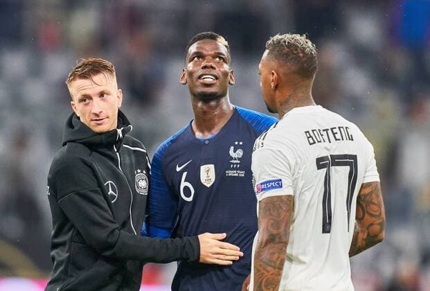 Germany - France, Soccer, Munich, September 06, 2018 Jerome BOATENG, Nr. 17 DFB Marco REUS, 11 DFB Paul POGBA, FRA 6 after the match GERMANY - FRANCE Important: DFB regulations prohibit any use of photographs as image sequences and or quasi-video. Football Nations League, Season 2018 2019, September 06, 2018 Munich, Germany. Photographer: Peter Schatz MAGICS