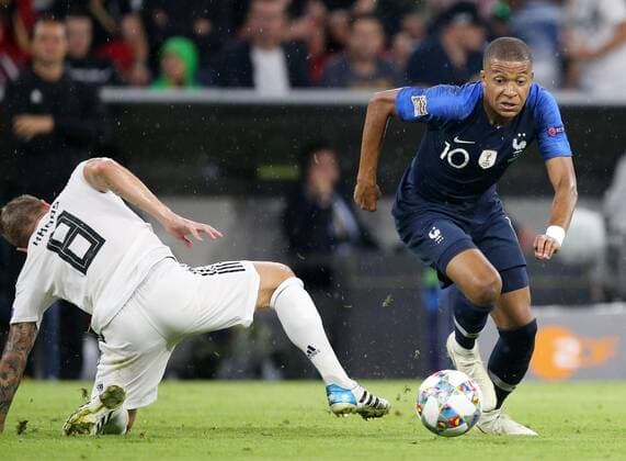SOCCER - UEFA NL, GER vs FRA MUNICH,GERMANY,06.SEP.18 - SOCCER - UEFA Nations League, Germany vs France, international match Länderspiel Image shows Toni Kroos (GER) and Kylian Mbappe (FRA). GEPAxpictures xThomasxBachun