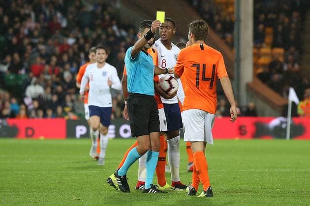 England U21 U 21 v Netherlands U21 UEFA EURO EM Europameisterschaft Fussball U21 2019 Qualifiers Carel Eiting of The Netherlands gets a yellow card from Referee Rob Reinshreiber (ISR) during the UEFA Euro U21 2019 Qualifiers match at Carrow Road, Norwich Content Not Available For UK Newspapers Copyright: xPaulxChestertonx FIL-12242-0048
