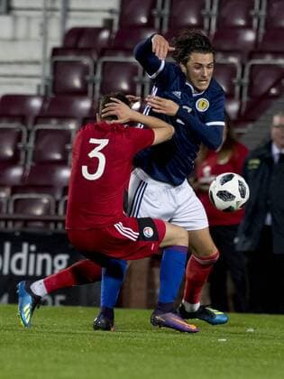 6th September 2018, Tynecastle Park, Edinburgh, Scotland; Under 21 European Championship EM Europameisterschaft Football, Scotland U21 U 21 versus Andorra U21; Fraser Hornby of Scotland and Eric De Pablos of Andorra battle for the ball  ActionPlus12060555 AlanxRennie