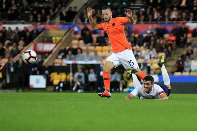 6th September 2018, Carrow Road, Norwich, England; UEFA Under 21 European Championship EM Europameisterschaft football, England U21 U 21 versus Netherlands U21; Bart Ramselaar of Netherlands U21 fouls Lewis Cook of England U21  ActionPlus12060595 ShaunxBrooks