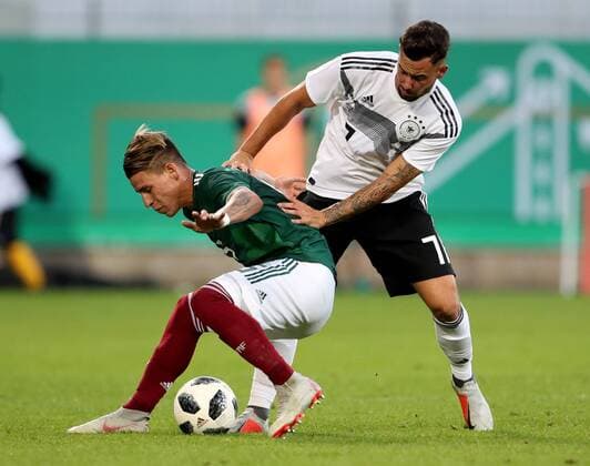 Sport Bilder des Tages Deutschland, Fürth, Sportpark Ronhof Thomas Sommer, 07.09.2018, Fussball - Laenderspiel - Deutschland U 21 - Mexiko U 21 Bild: v. lk. Cristian Calderon (Mexiko, 5) und Marco Richter (Deutschland, 7) DFB REGULATIONS PROHIBIT ANY USE OF PHOTOGRAPHS AS IMAGE SEQUENCES AND OR QUASI-VIDEO. Copyright: HMBxMedia xHeikoxBecker