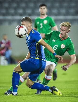 7th September, Olympic Stadium Adem Jashari, Mitrovice, Kosovo; UEFA Under 21 European Championship EM Europameisterschaft qualifier, Kosovo U21 U 21 versus Republic of Ireland U21; Henry Charsley of Republic of Ireland challenged as he clears  ActionPlus12060711 NikolaxKrstic