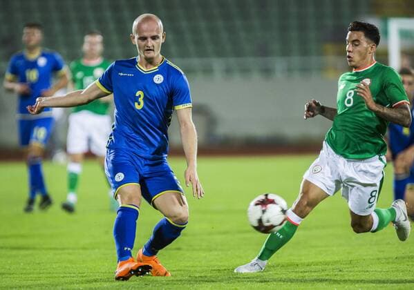 7th September, Olympic Stadium Adem Jashari, Mitrovice, Kosovo; UEFA Under 21 European Championship EM Europameisterschaft qualifier, Kosovo U21 U 21 versus Republic of Ireland U21; Arian Kabashi of Kosovo passes as Reece Grego-Cox of Republic of Ireland closes in  ActionPlus12060722 NikolaxKrstic