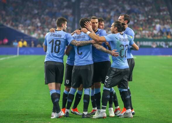 HOUSTON, TX - SEPTEMBER 07: Uruguay defender Jose Maria Gimenez (2) is congratulated by teammates for scoring a goal during the soccer match between Mexico and Uruguay on September 7, 2018 at NRG Stadium in Houston, Texas. (Photo by Leslie Plaza Johnson Icon Sportswire) SOCCER: SEP 07 Mexico v Uruguay Icon180907004 EDITORIAL USE ONLY