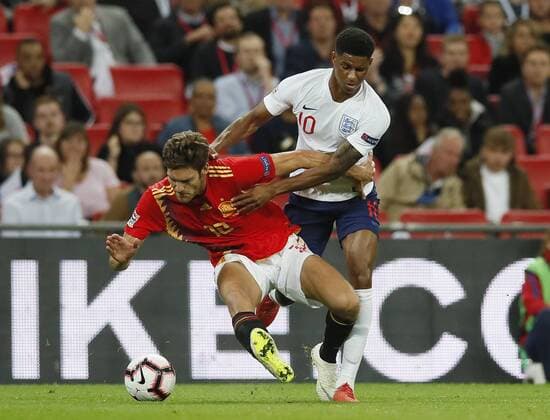 Marcus Alonso of Spain tackled by Marcus Rashford of England during the UEFA Nations League - League A - Group 4 match at Wembley Stadium, London. Picture date 8th September 2018. Picture credit should read: David Klein Sportimage EDITORIAL USE ONLY. No use with unauthorised audio, video, data, fixture lists, club league logos or live services. Online in-match use limited to 120 images, no video emulation. No use in betting, games or single club league player publications.