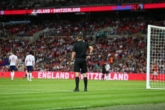 8th September 2018, Wembley Stadium, London, England; UEFA Nations League football, England versus Spain; 5th official referee stands next to the goal post  ActionPlus12061077 JohnxPatrickxFletcher