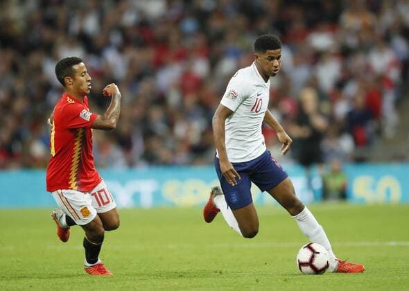 Marcus Rashford of England runs past Thiago of Spain during the UEFA Nations League - League A - Group 4 match at Wembley Stadium, London. Picture date 8th September 2018. Picture credit should read: David Klein Sportimage EDITORIAL USE ONLY. No use with unauthorised audio, video, data, fixture lists, club league logos or live services. Online in-match use limited to 120 images, no video emulation. No use in betting, games or single club league player publications.