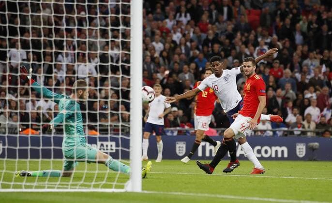 David De Gea of Spain saves a shot from Marcus Rashford of England during the UEFA Nations League - League A - Group 4 match at Wembley Stadium, London. Picture date 8th September 2018. Picture credit should read: David Klein Sportimage EDITORIAL USE ONLY. No use with unauthorised audio, video, data, fixture lists, club league logos or live services. Online in-match use limited to 120 images, no video emulation. No use in betting, games or single club league player publications.