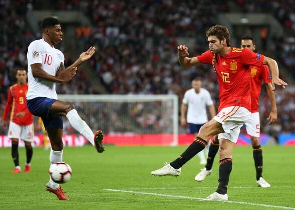 8th September 2018, Wembley Stadium, London, England; UEFA Nations League football, England versus Spain; Marcos Alonso of Spain shoots past Marcus Rashford of England  ActionPlus12061100 JohnxPatrickxFletcher