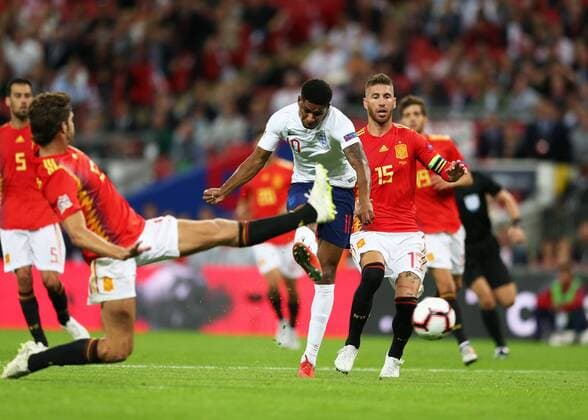 8th September 2018, Wembley Stadium, London, England; UEFA Nations League football, England versus Spain; Marcus Rashford of England shoots for on goal but its saved by Goalkeeper David de Gea of Spain  ActionPlus12061101 JohnxPatrickxFletcher