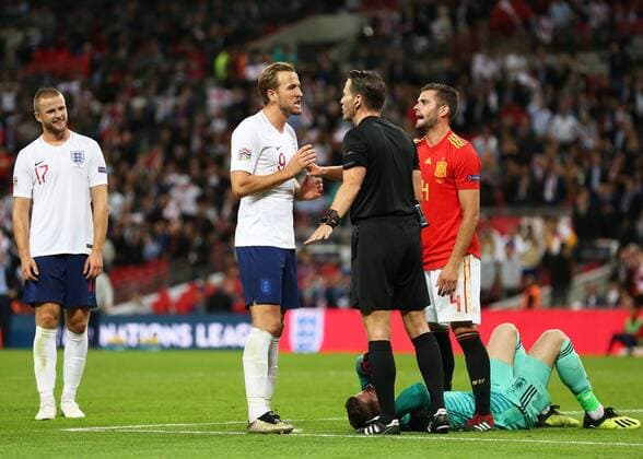 8th September 2018, Wembley Stadium, London, England; UEFA Nations League football, England versus Spain; Harry Kane of England with Referee Danny Makkelie after the 2nd goal from Danny Welbeck of England in extra time was disallowed by the fifth official after a foul on Goalkeeper David de Gea of Spain  ActionPlus12061128 JohnxPatrickxFletcher