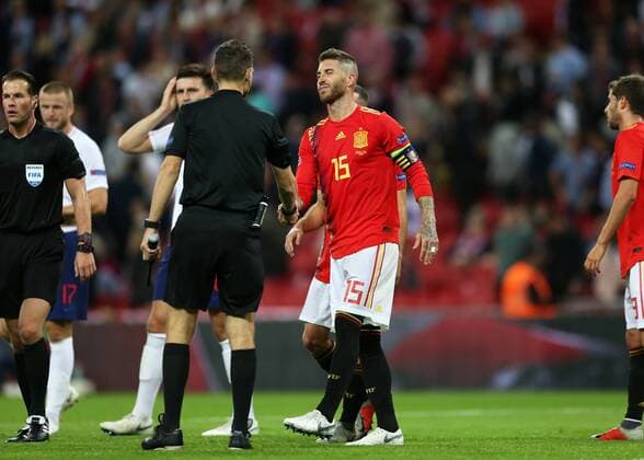 8th September 2018, Wembley Stadium, London, England; UEFA Nations League football, England versus Spain; Sergio Ramos of Spain winking and shaking hands with the fifth official after full time  ActionPlus12061130 JohnxPatrickxFletcher