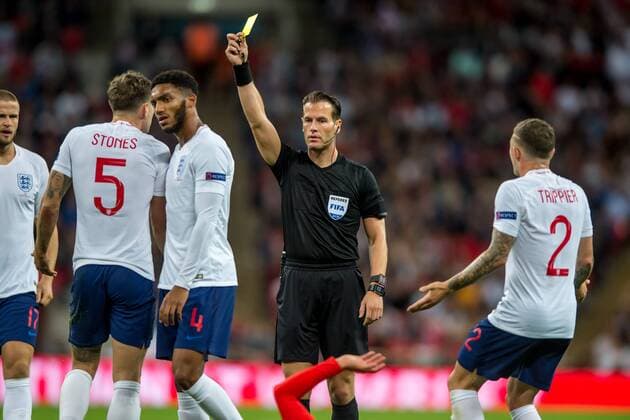 John Stones of England receives a yellow card during the UEFA Nation League, Group 4, League A match between England and Spain at Wembley Stadium, London, England on 8 September 2018. Copyright: xSalvioxCalabresex 20960041