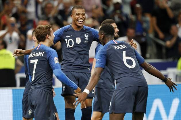 SAINT DENIS, 09-09-2018, Stadium Stade France , football, season 2018 2019, Nations Cup. France player Kylian Mbappe (C) celebrating his 1-0 with France player Antoine Griezmann (L) and France player Paul Pogba (R) during the game France - Netherlands . France - Netherlands  x2457101x