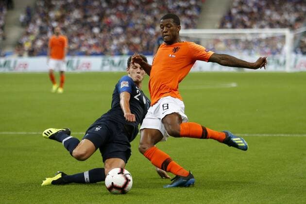 Fußball, Nations League, Frankreich - Niederlande SAINT DENIS, 09-09-2018, Stadium Stade France , football, season 2018 2019, Nations League , Netherlands player Georginio Wijnaldum , France player Benjamin Pavard during the game France - Netherlands France - Netherlands  x2457202x
